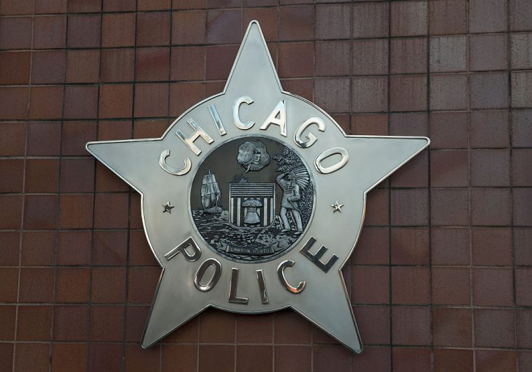 Suspect in custody, 1 police officer killed, other in critical condition, after shooting at Chicago hospital
